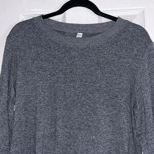 Alo Yoga high low over the head long sleeve top.